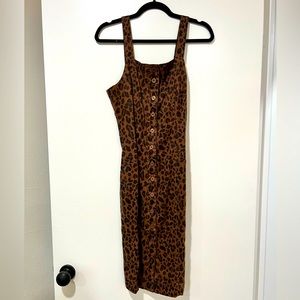 Never been worn! Still has the tags on it! MIDI dress- leopard print